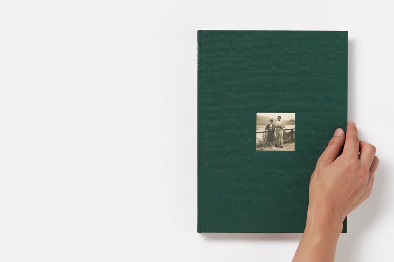 © Byron Co - MOMENTOUS front cover, ready to be opened.