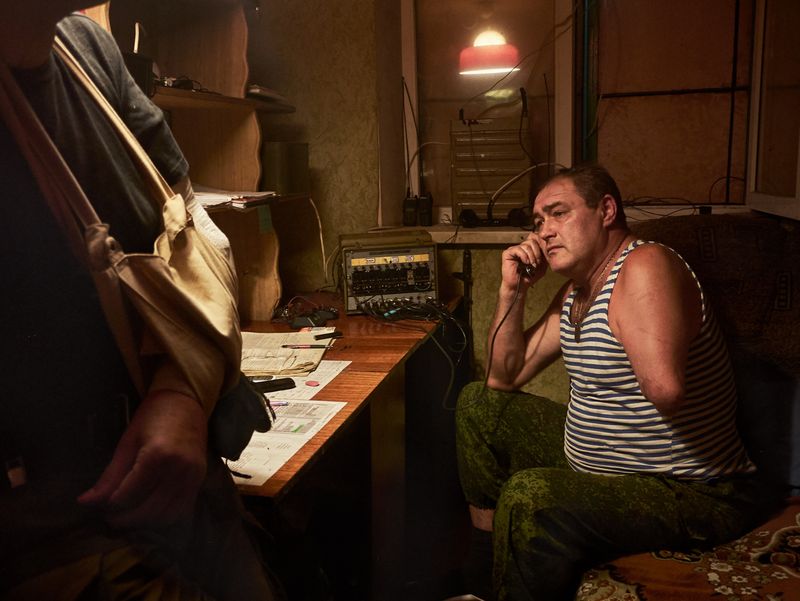 © Alfredo Bosco - Ukraine; Donbass region; Donetsk; 2017 A wounded volunteer communicating with the frontline.
