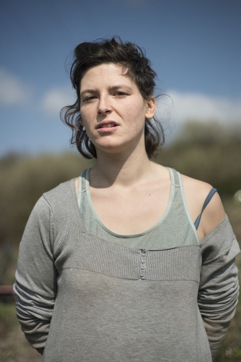 © Penelope Thomaidi - Sarah, inhabitant of the ZAD, in the medicinal garden of Le Moulin collective. March 2018.