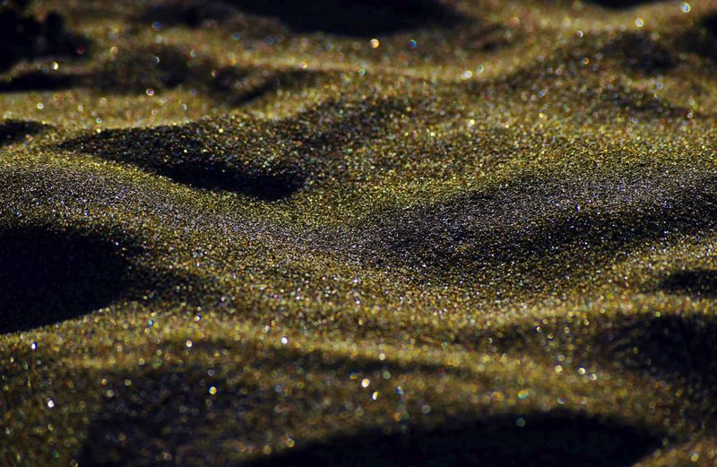 © Kelly Vivian - Gold Dust.A macro shot of the gorgeous soft black sand of Piha Beach on Auckland's west coast.