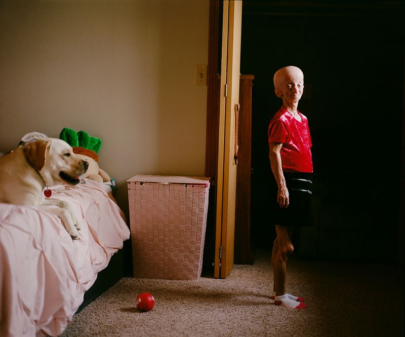 © Logan  White - Kaylee and her dog, Iris.