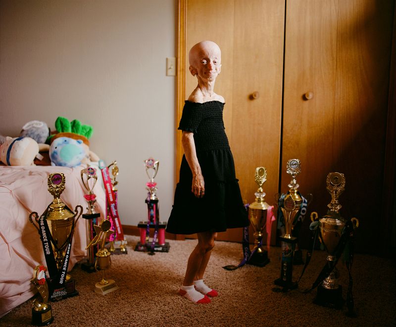 © Logan  White - Kaylee with her dance trophies.