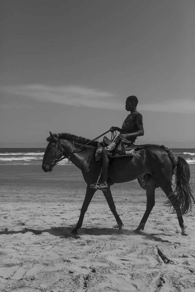 © Reuben - (The Horse) On the local beach of Accra, Ghana, a man rides a horse—a now uncommon mode of transport.