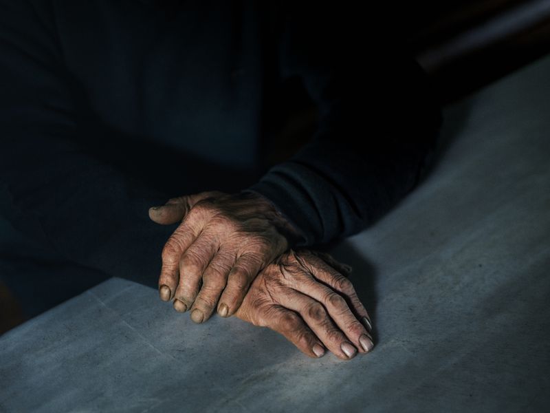 © Adra Pallón - Manuel lives alone in an isolated village in the province of Lugo. He spends most of the winter in the kitchen by the fire.