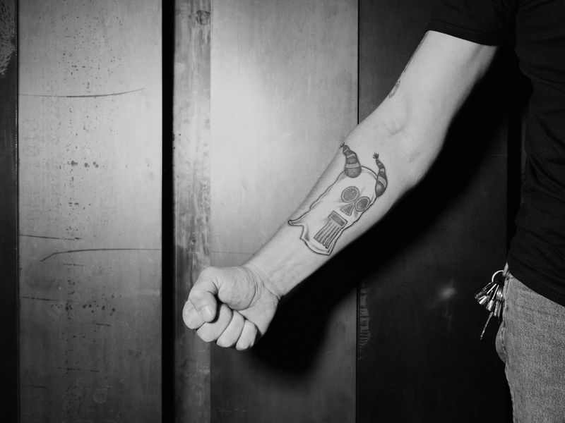 © Jenna Garrett - 'Tattoo.' Tattoo belonging to a man in a local motorcycle gang called “The Hooded Ones.”