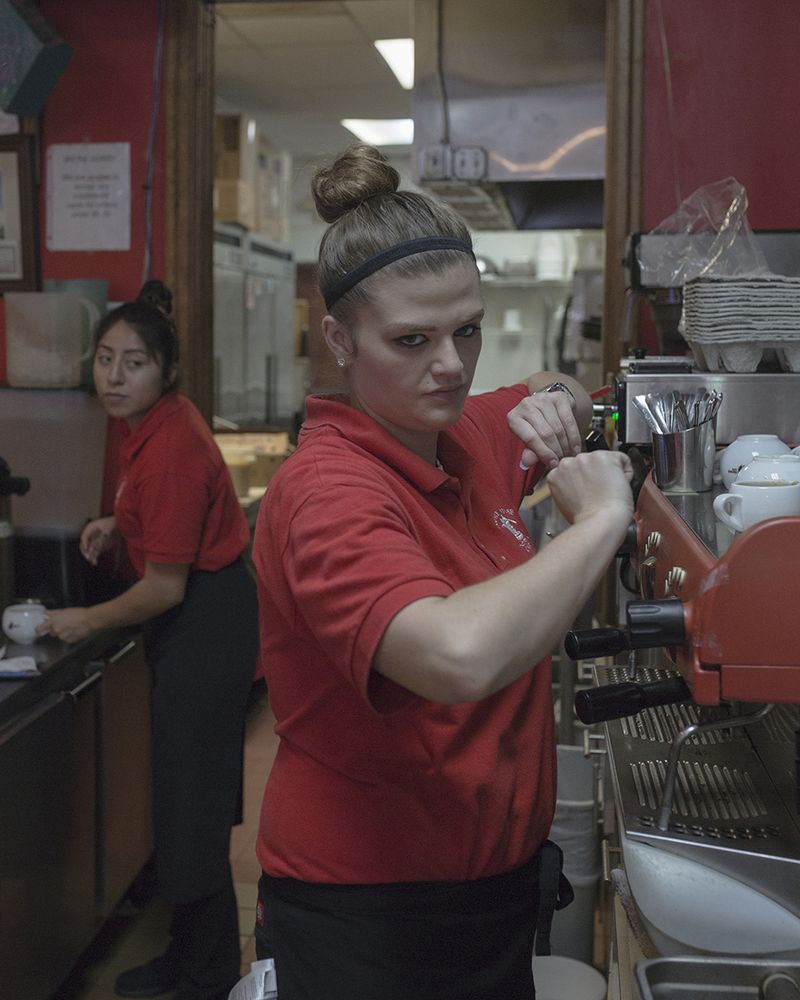 © Allison Hess - A server makes an espresso drink at a local cafe, as I once did the same.