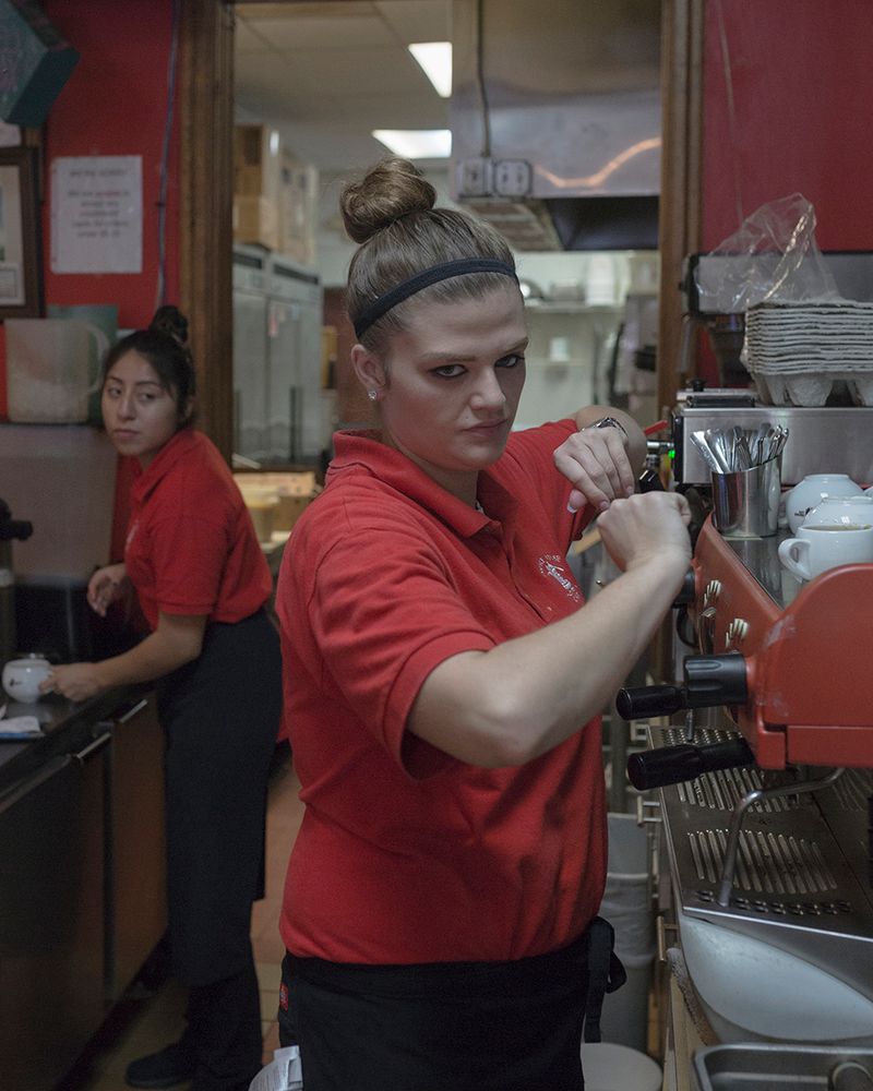 © Allison Hess - A server makes an espresso drink at a local cafe, as I once did the same.