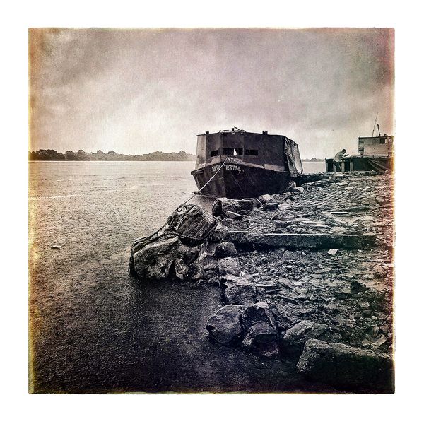 © Marcelo David Sandoval - Rain on the port of 'Ita Enramada' (in english 'stone pergola')