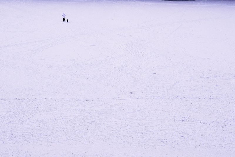 © Emine Gozde Sevim - Untitled from the series, Sininen Hetki, 2026. (Walk on the frozen sea)