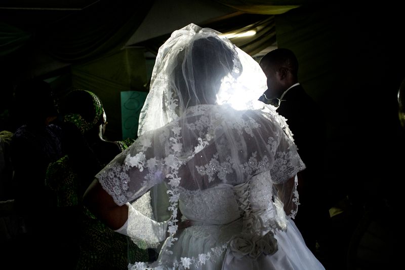 © Glenna Gordon - A bride struts down the aisle with "swagger." Weddings are big business in petrol rich Nigeria.