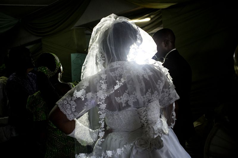 © Glenna Gordon - A bride struts down the aisle with "swagger." Weddings are big business in petrol rich Nigeria.