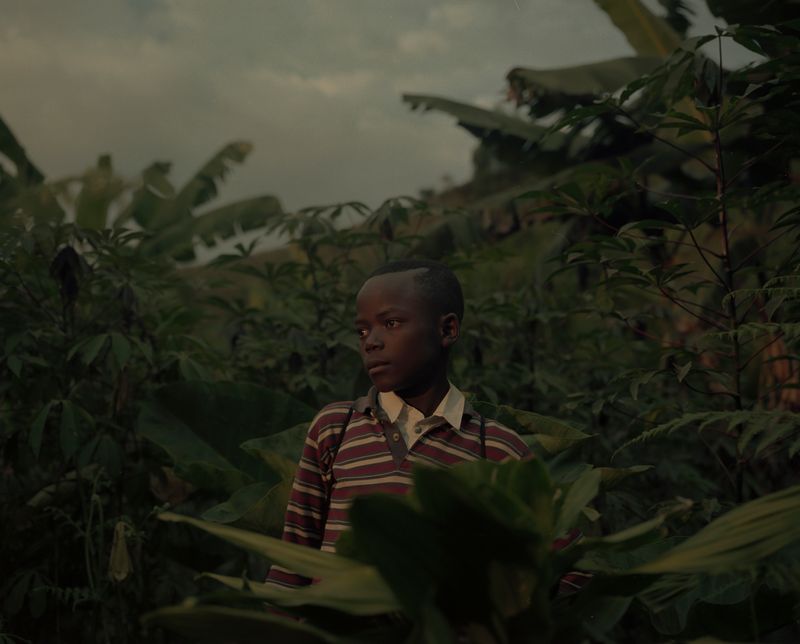 © Cécile Smetana - Hide & Seek. Children playing hide and seek on the island of Idjwi.