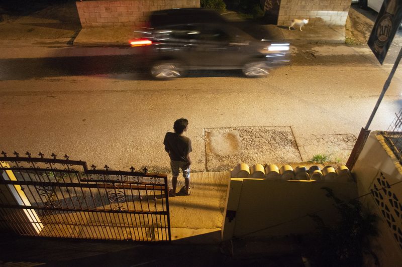 © Johanne Rahaman - Simon Khan stands out on Saddle Road, waiting for my nephew Leon to come collect me. Maraval, 2017