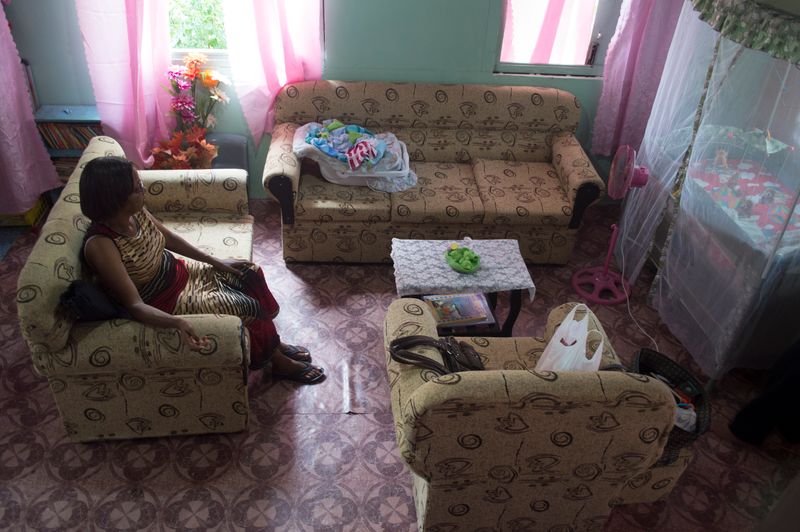© Johanne Rahaman - My sister Sharon Rahaman, in the children's room at the home of brother Courtenay. Diego Martin, Trinidad 2016