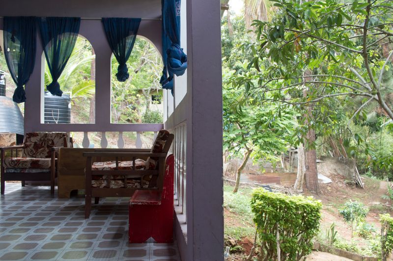 © Johanne Rahaman - A view of the porch and garden at home of brother Courtenay Rahaman. Diego Martin, Trinidad 2016