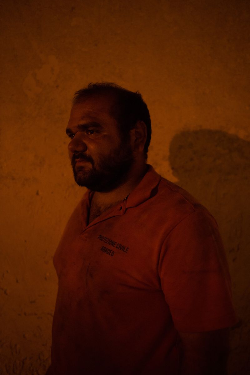 © Veronica Andrea Sauchelli - Aradeo, Lecce, Italy Luigi, 28 years old, Civil Protection volunteer, after extinguishing a fire.