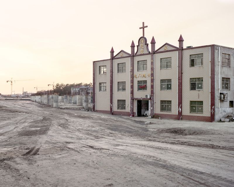 © Dustin Shum - Catholic church next to the upcoming railway station. Shangqiu City, Henan Province. 5/2015
