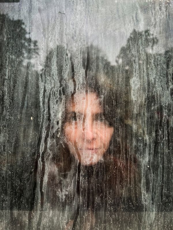 © Irene Alison - Image from the The Feather Collector photography project