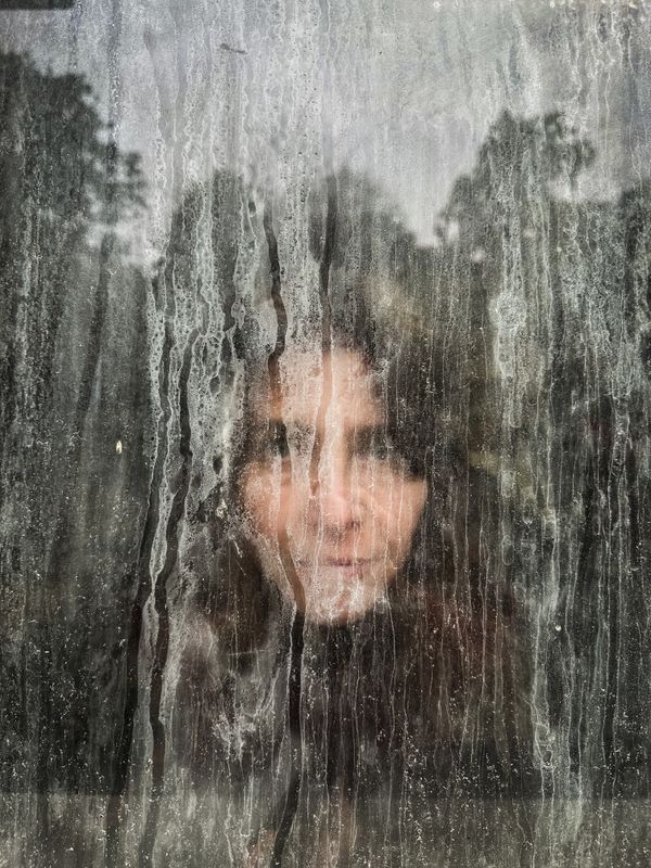 © Irene Alison - Image from the The Feather Collector photography project