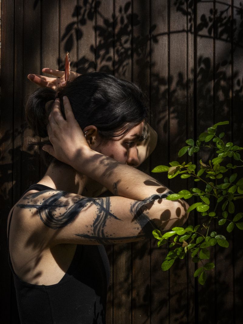 © Irene Alison - Image from the The Feather Collector photography project