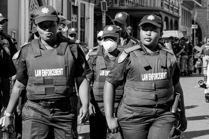 © Nicole Vittoria de Jager - Enforcing It Moving in groups, these law enforcement officers make sure their presence does not go unnoticed.