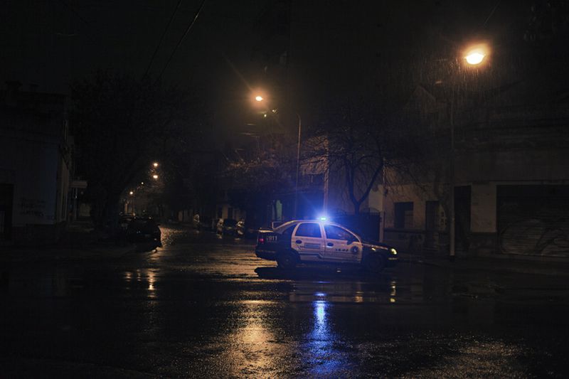 © Myriam Meloni - A police car during a night patrol.