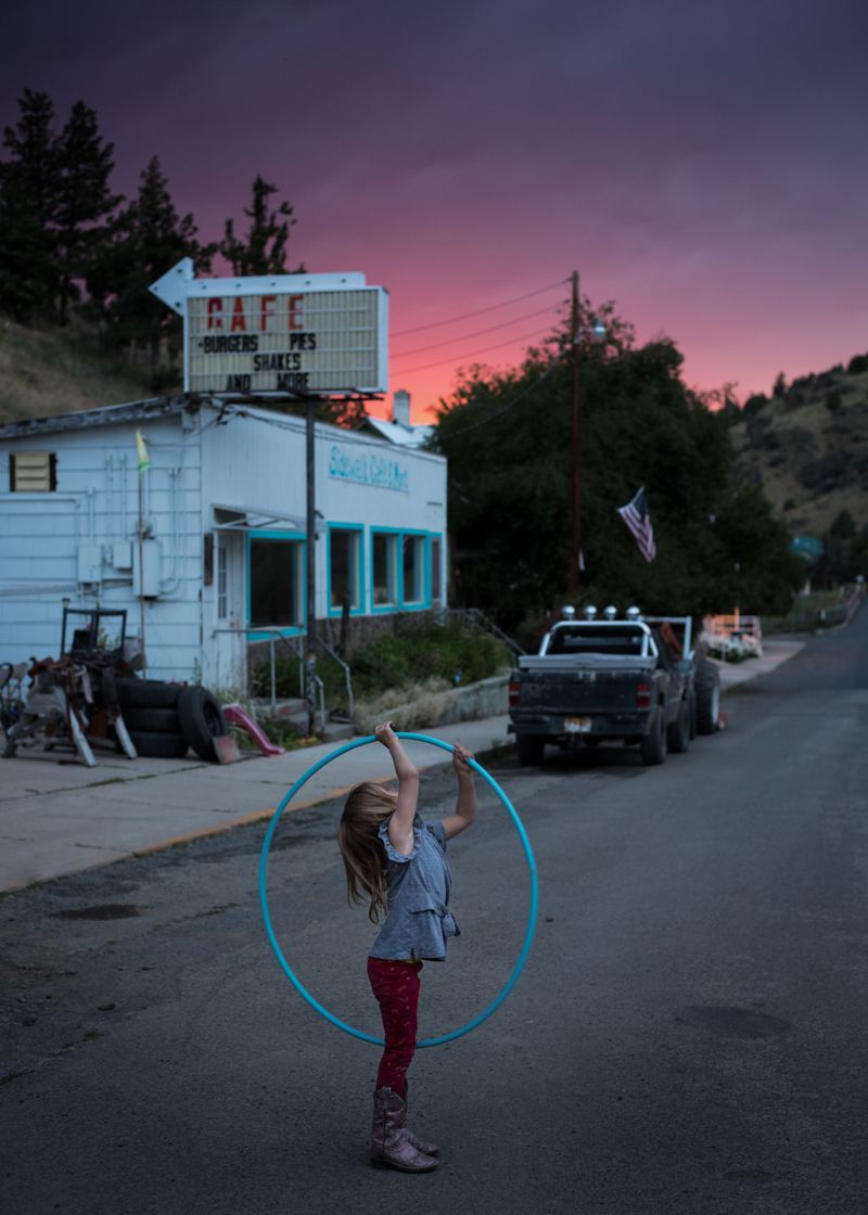 © Rosie Day - Letty (age 5) under a heat lighting sky. Mitchell, Oregon (Pop.120)