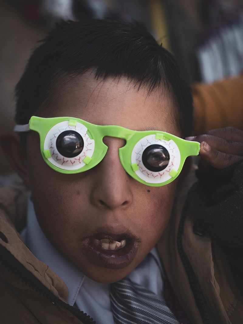© Stefano Sbrulli - A children during the festivity of La Virgen de la Paz.