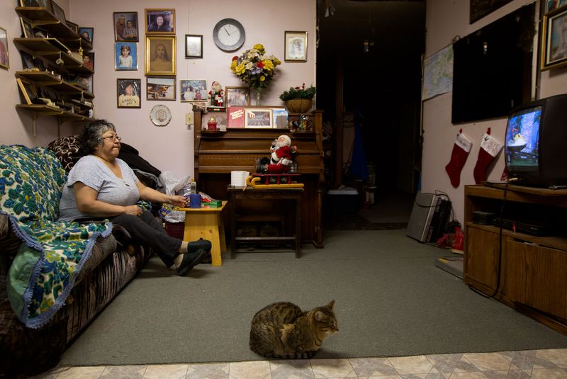 © Nima Taradji - Lena Weyiouanna, 64, a longtime resident of the village, works as a janitor at the Shishmaref Clinic. (Nima Taradji/Polaris)