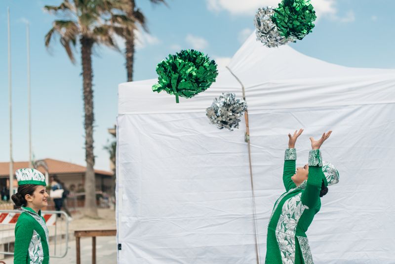 © Agnese Morganti - Viareggio, 2017. Young majorettes play with their pom poms.