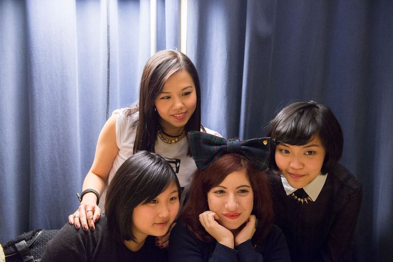© Agnese Morganti - Florence, a group of Chinese and Italian friends pose for a portrait.