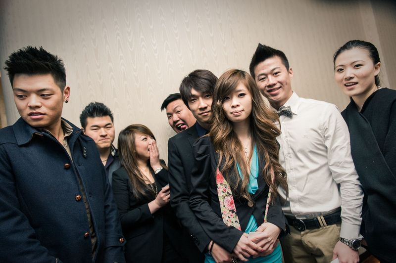 © Agnese Morganti - Florence, young party-goers pose for a welcome photo before an Asian Party event