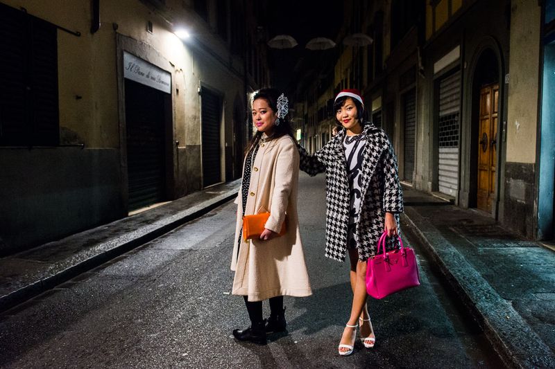 © Agnese Morganti - Florence, Cristina and Jessica, both fashion design students, pose for a photo in the San Frediano neighbourhood of Florence