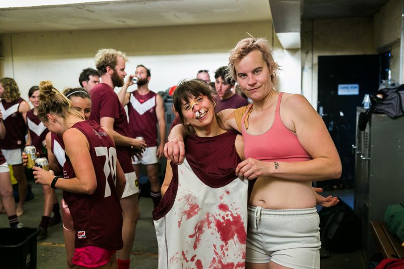 © J Forsyth - Salty(right) removed her jumper on field to stop the bleeding of her team mate (left)
