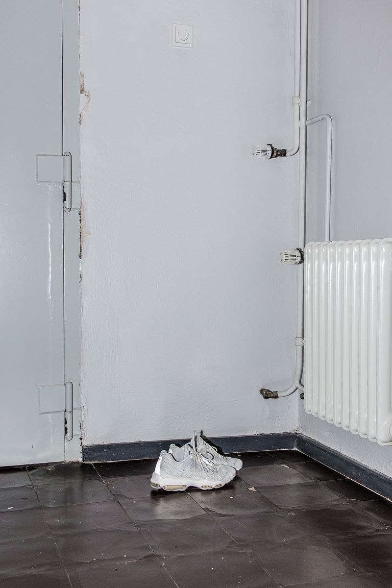 © Lukas Ratius - Shoes of a person in custody in the St. Johann police inspection