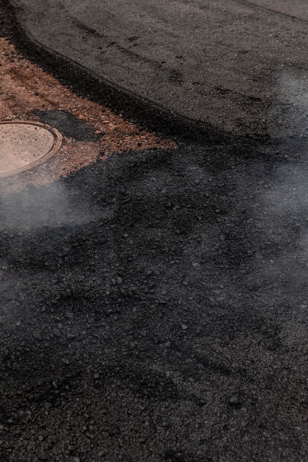 © Lukas Ratius - Asphalting work on an access road through the state capital Saarbrücken