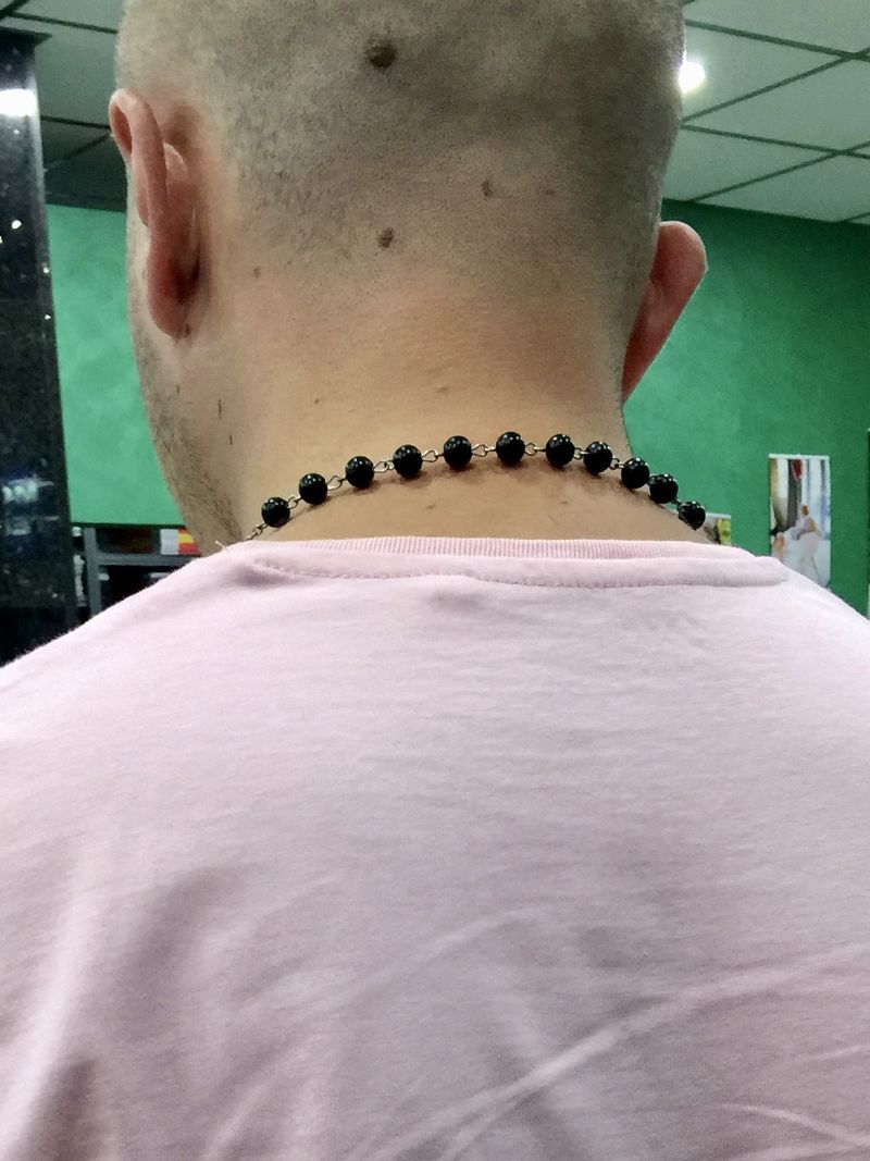 © Filip Bojovic - Man wearing traditional Serbian Orthodox rosary necklace.