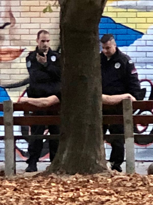 © Filip Bojovic - Quiet afternoon chat with the police in the hood.