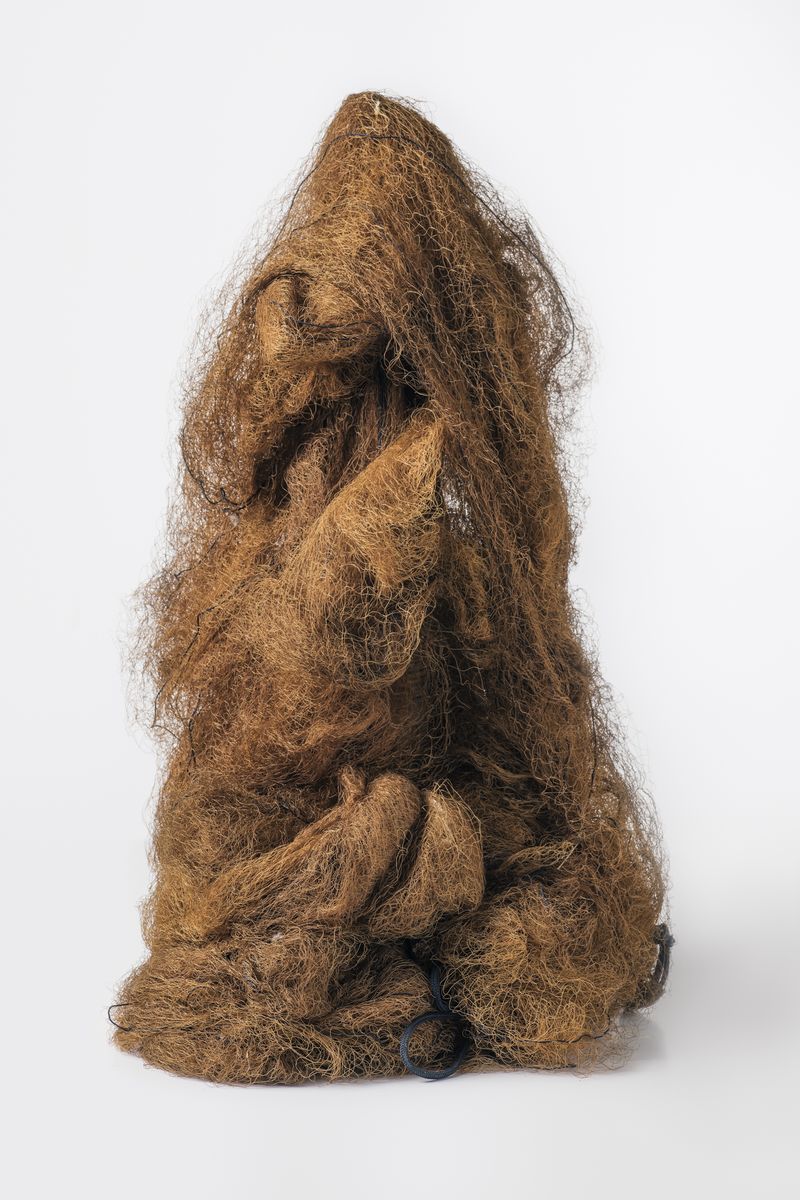 © Silvio Rusmigo - Rolled and bundled 15x4 metres mist-net, functioning as an invisible bird-trap when set up on net poles between shrubs