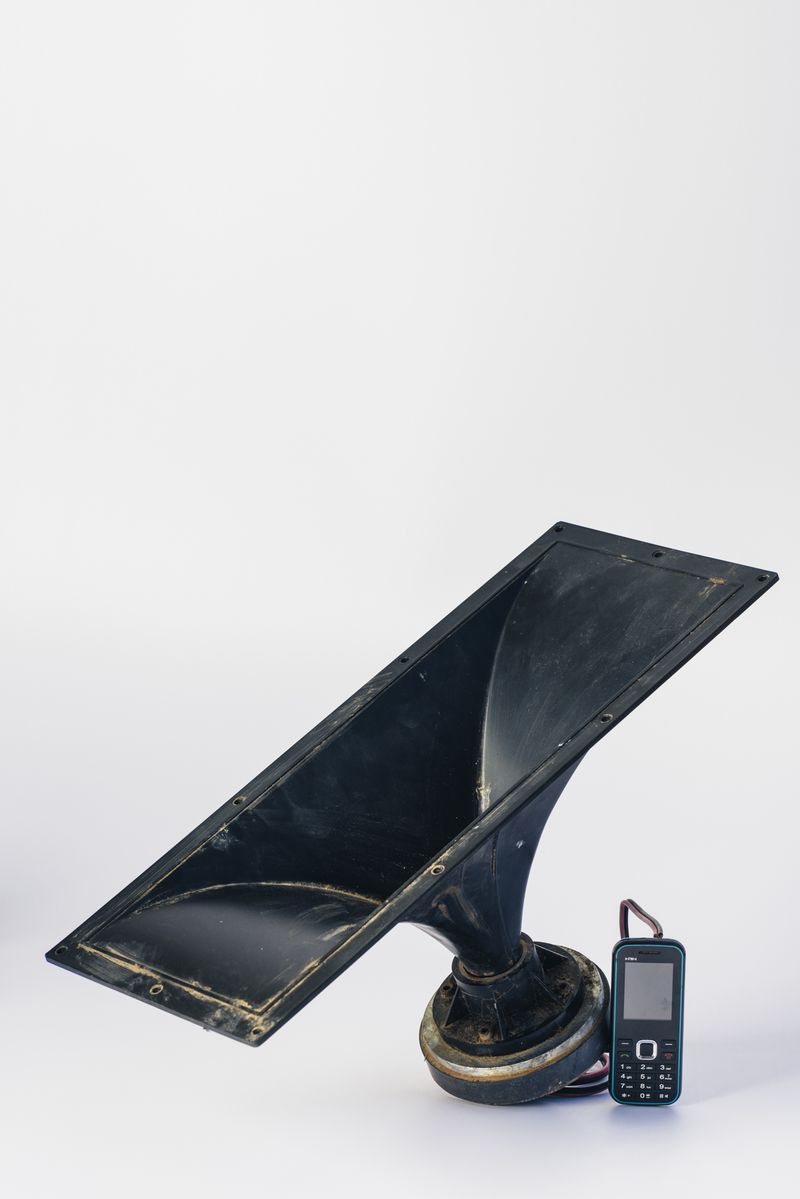 © Silvio Rusmigo - Large speaker connected to mobile phone, functioning as decoy to lure birds to traps