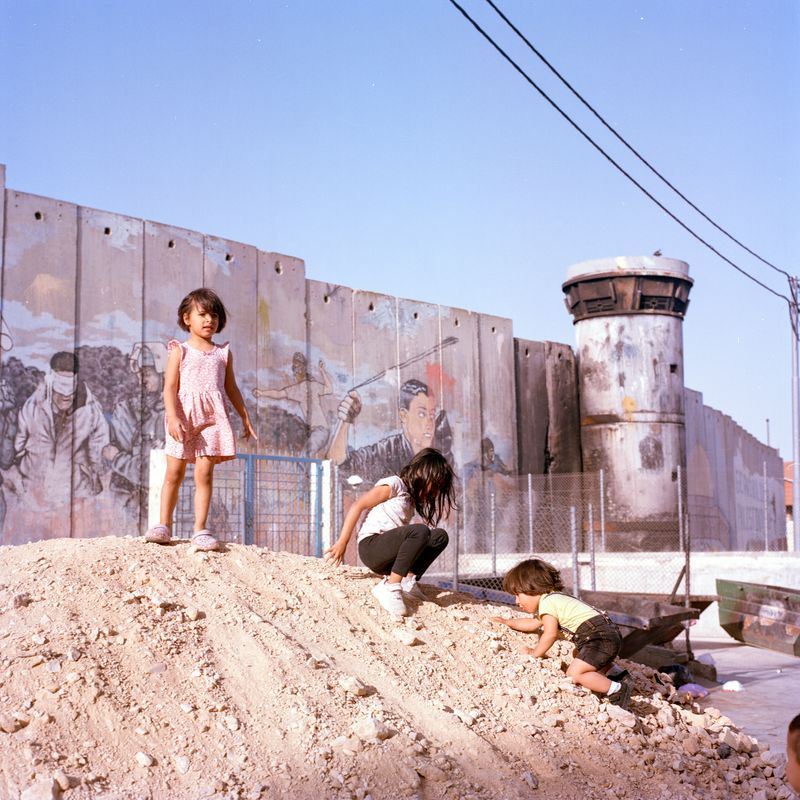 © Fabrizio Bilello - Some kids playing under the separation wall in Ayda refuge camp. Bethlehem, May 2023.