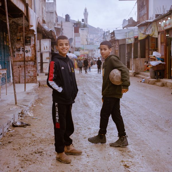 © Fabrizio Bilello - Two kids pose for a portrait in Balata refuge camp.Nablus, December 2024.