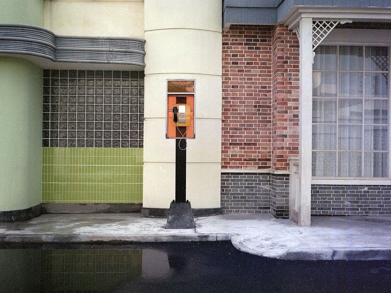 © Ge Zeng - A telephone booth covered in graffiti