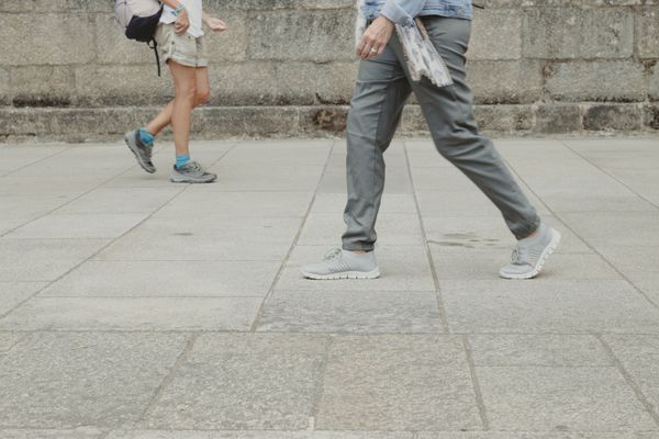 © Ana Norman Bermudez - Pilgrims and locals cross paths in Santiago de Compostela's streets.
