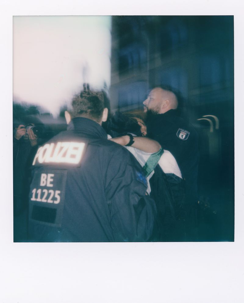 © Shirin Abedi - Police arrest a protester during a peaceful demonstration in Berlin.