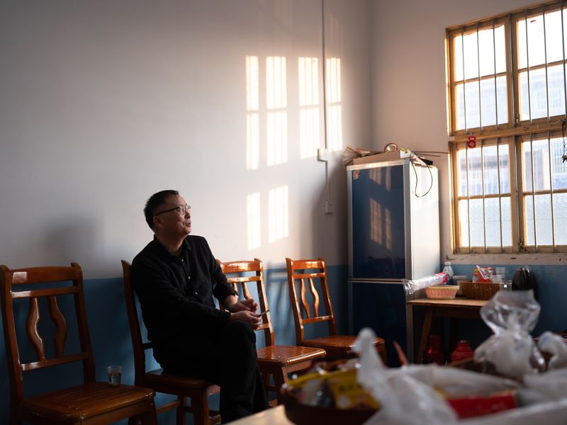 © Shina Peng - Uncle taking a break in the sun.