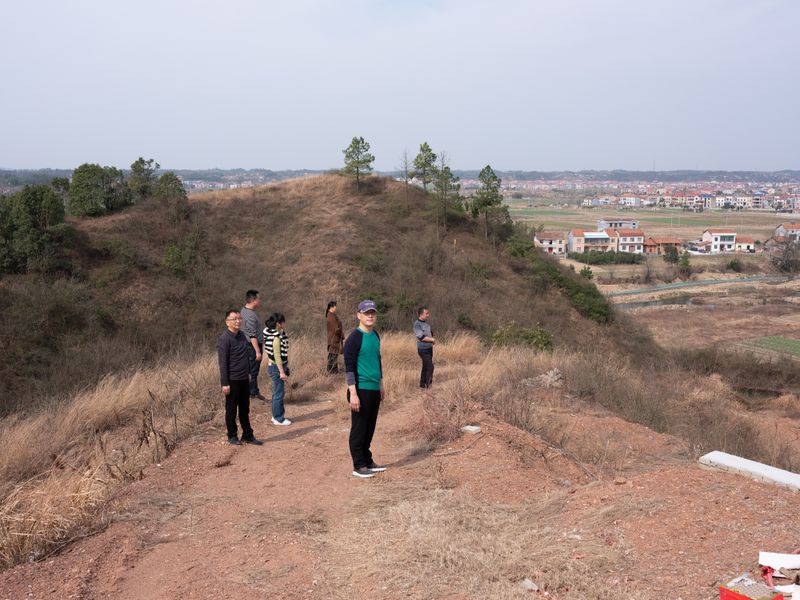 © Shina Peng - Dad and my relatives on our ancestral graves.