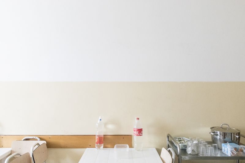 © Manuela Schirra and Fabrizio Giraldi  - Table set for breakfast in the Diocesan Caritas building.