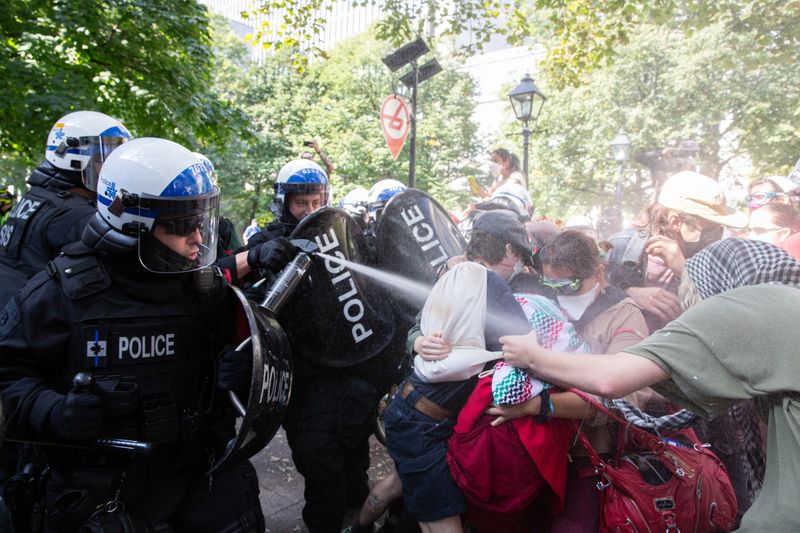 SPVM pepper spraying demonstrators.