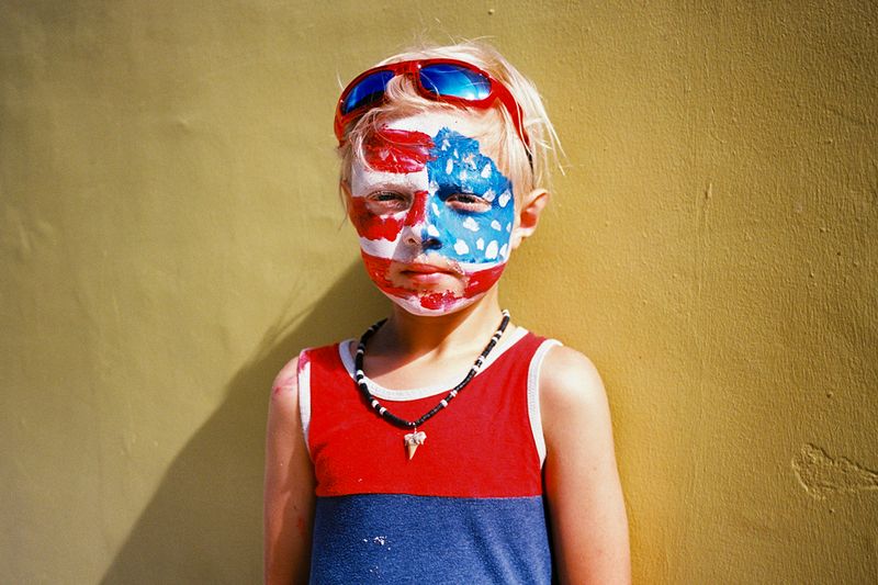© Rachel Fleischman - Young American on vacation with his parents and sister on the Fourth of July on St. George Street. (2025)
